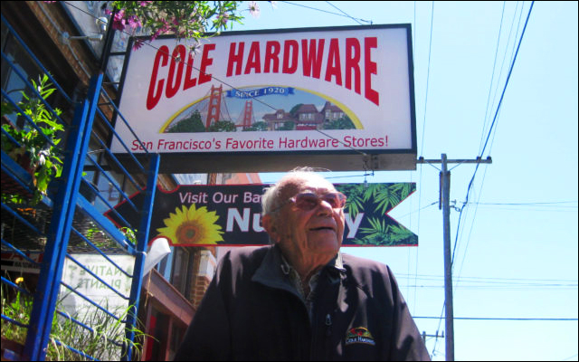 Dave Karp in Front of Cole Hardware Sign